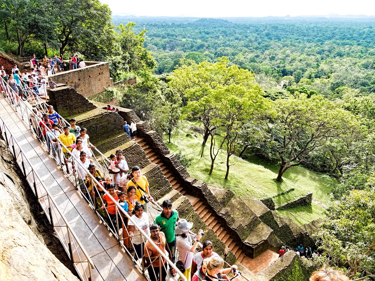 The end of the first phase of the climb up Sigiriya (Lion Rock) where tourists queue up to show their ticket again in order to continue on. The Ancient City of Sigiriya was declared a UNESCO World Heritage Site in 1982.